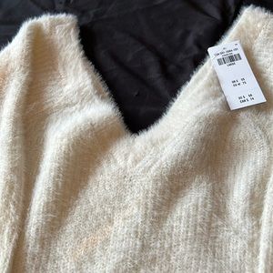 Cream sweater dress. Super soft never worn tags attached., great for holidays